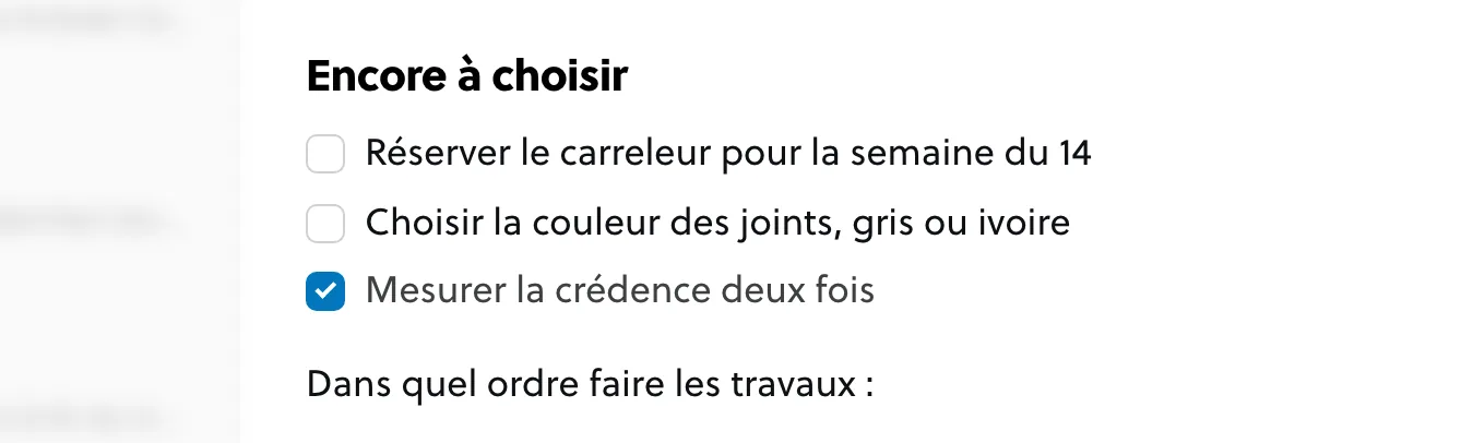 Une liste de tâches avec deux éléments encore à faire et un élément coché, descendu tout en bas.