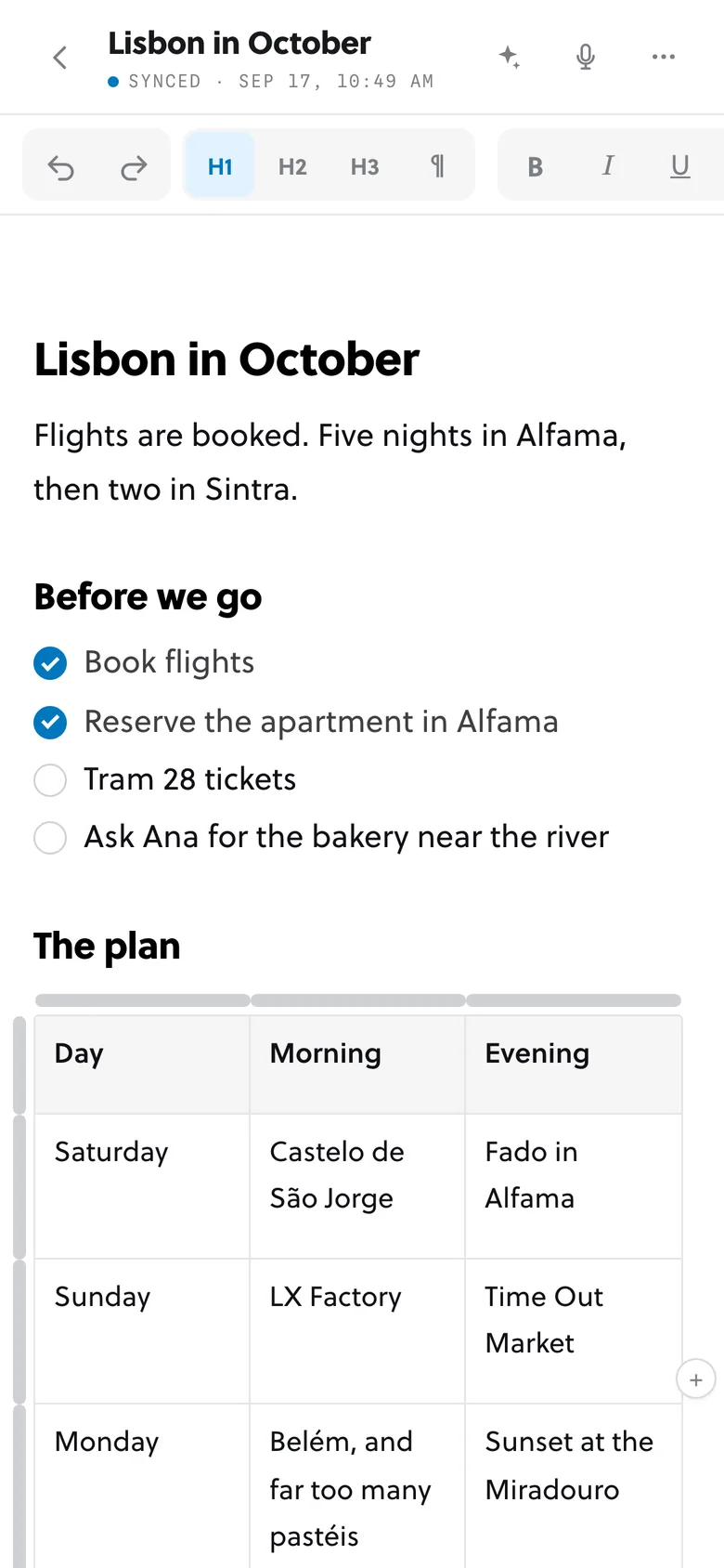 Scratchpad on a phone showing a Q4 launch plan note with owners and a checklist.